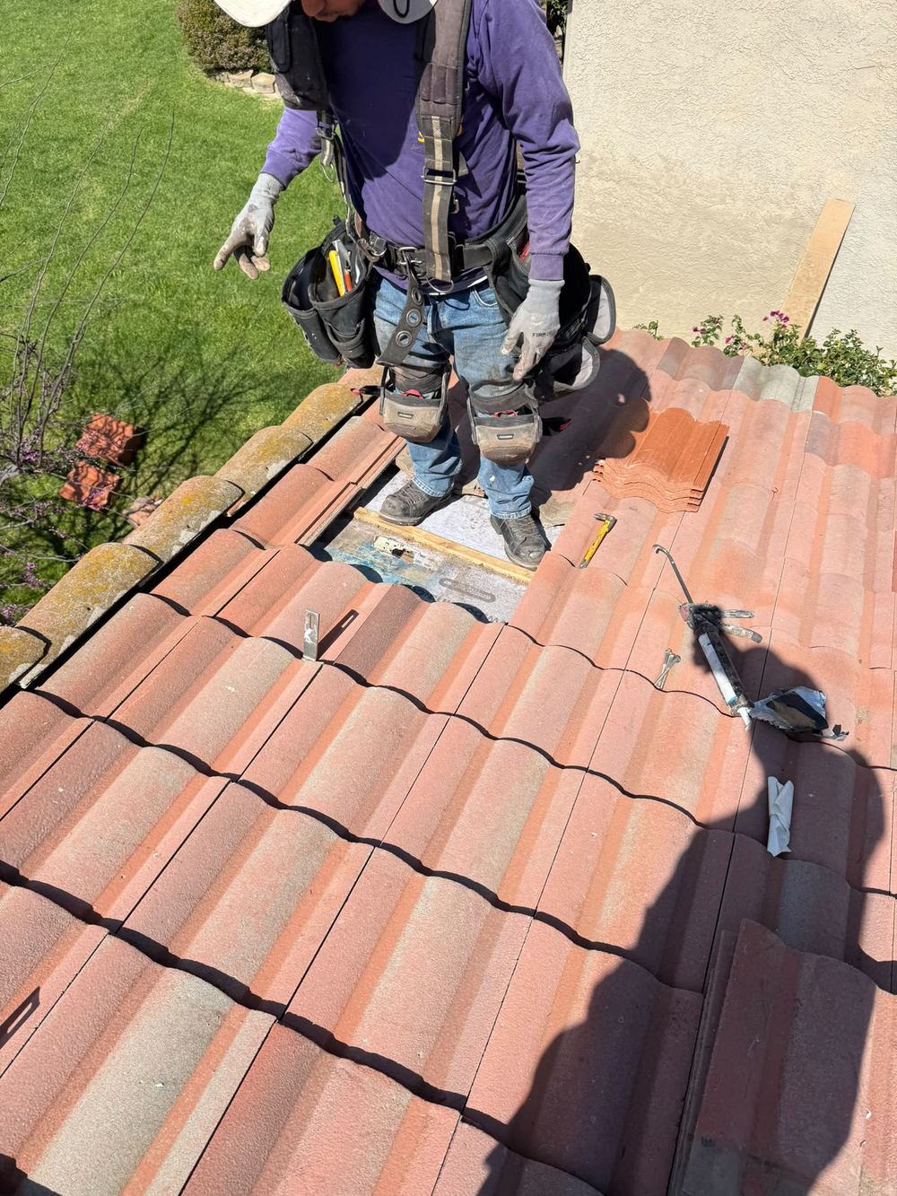 CaliPeak roofer repairing a Spanish tile roof